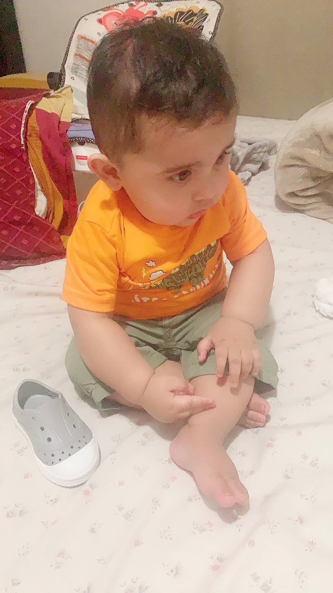 Shazil joined the competition — help win amazing prizes! baby, baby_toddler_clothing, barefoot, cheek, child, comfort, finger, flooring, foot, fun, gadget, head, human_leg, knee, person, sitting, skin, sleeve, thigh, thumb