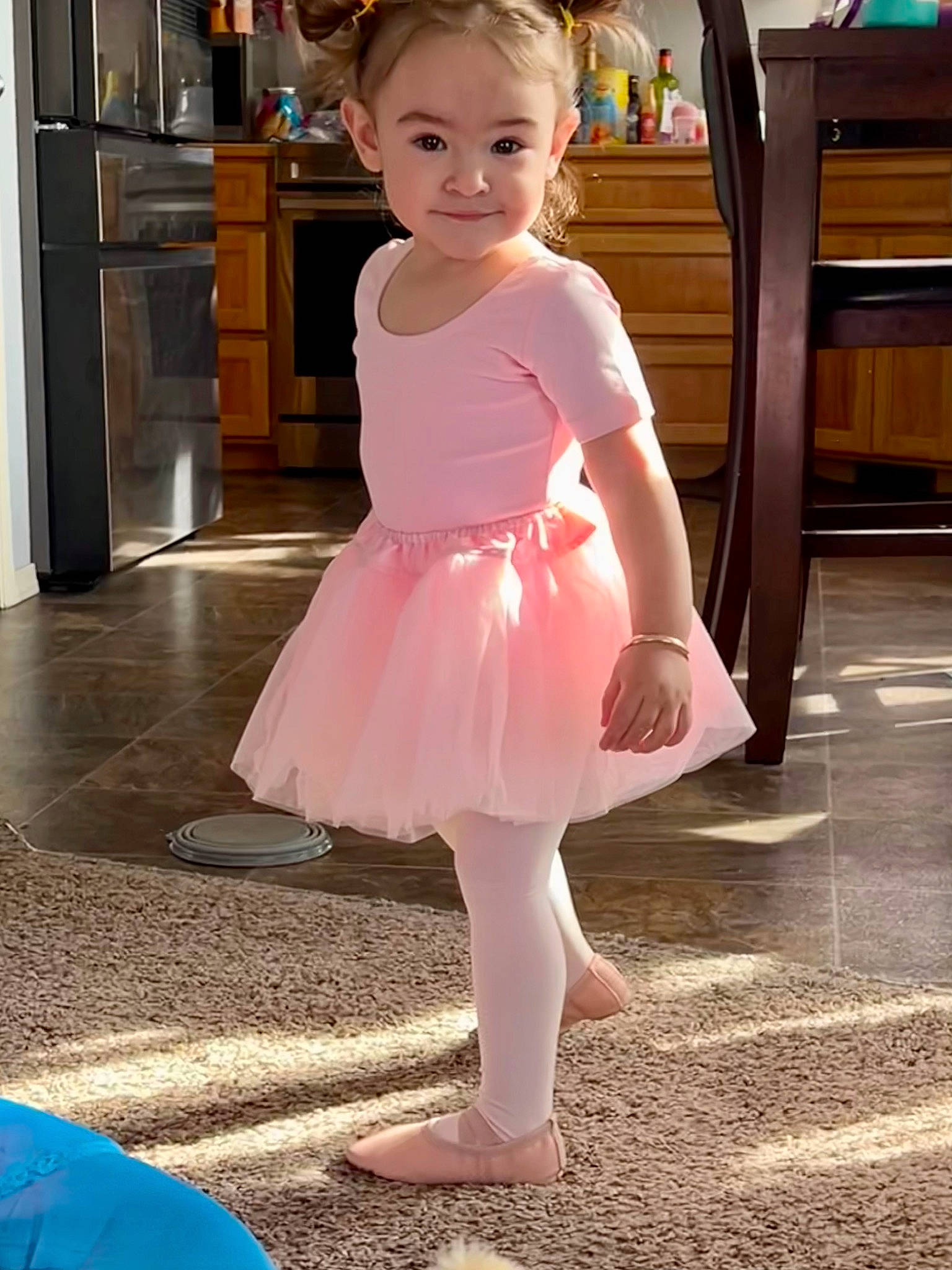 Izabella joined the competition — help win amazing prizes! baby_toddler_clothing, ballet_tutu, cabinetry, child, day_dress, dress, embellishment, event, fashion_design, floor, flooring, human_leg, kitchen_appliance, magenta, one_piece_garment, person, pink, sleeve, smile, toddler