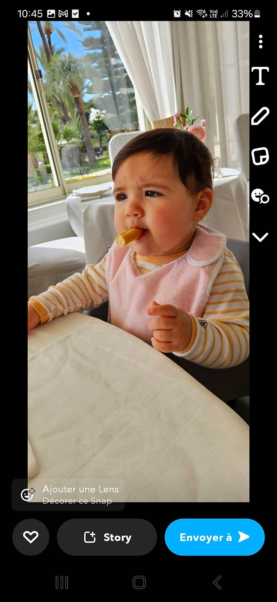 Mencïa a rejoint le concours — aidez-le/la à gagner de superbes lots ! baby, baby_toddler_clothing, cheek, child, eyelash, facial_expression, finger, food_craving, gesture, happy, mouth, nose, person, product, sitting, skin, sleeve, sweetness, t_shirt, tableware