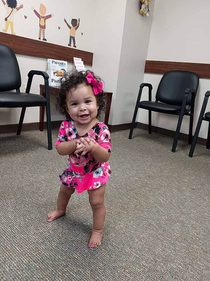 Malaysia is registered to the contest to win money with this photo: baby, baby_toddler_clothing, barefoot, chair, child, event, face, floor, flooring, foot, fun, furniture, happy, human_leg, joy, person, sleeve, smile, standing, t_shirt