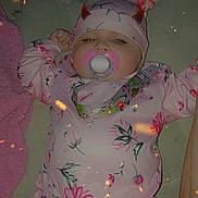 Mireyah joined the competition — help win amazing prizes! arm, baby, bed, blanket, cute, devil_horns_filter, eyes, face, floral_onesie, hand, hat, infant, mattress, pacifier, pacifier_clip, pink, portrait, sleepy, soft_texture, sparkles