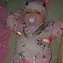 arm, baby, bed, blanket, cute, devil_horns_filter, eyes, face, floral_onesie, hand, hat, infant, mattress, pacifier, pacifier_clip, pink, portrait, sleepy, soft_texture, sparkles