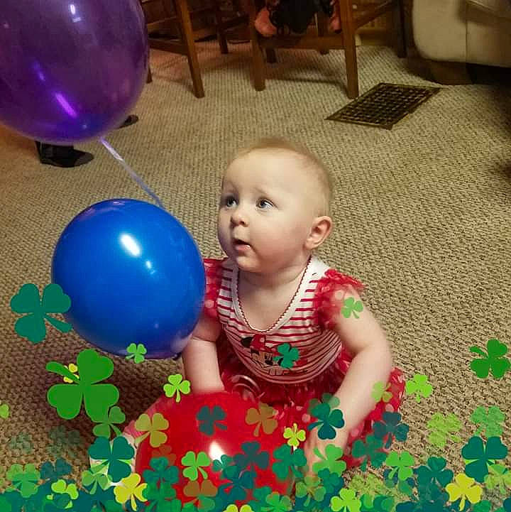 Ashleigh is registered to the contest to win money with this photo: baby, ball, balloon, child, fun, party, party_supply, person, play, smile, toddler, toy