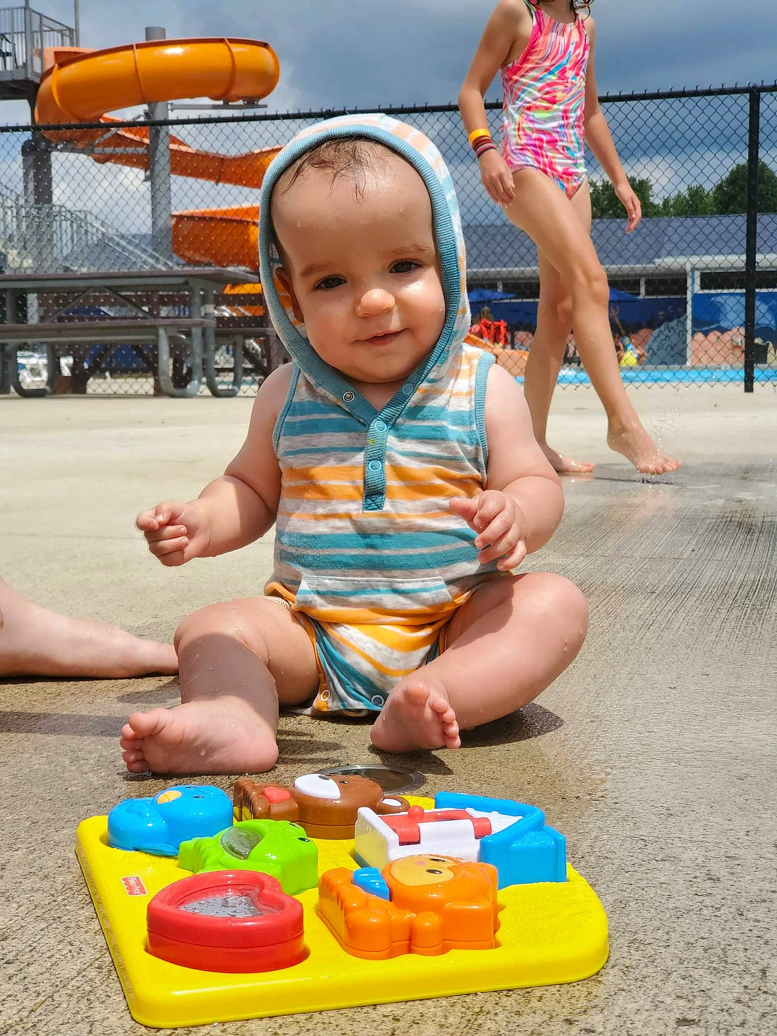 Maximus is registered to the contest to win money with this photo: baby, baby_playing_with_toys, baby_toddler_clothing, child, fun, happy, joy, leisure, people, person, photograph, product, public_space, recreation, shorts, smile, snapshot, summer, toddler, toy