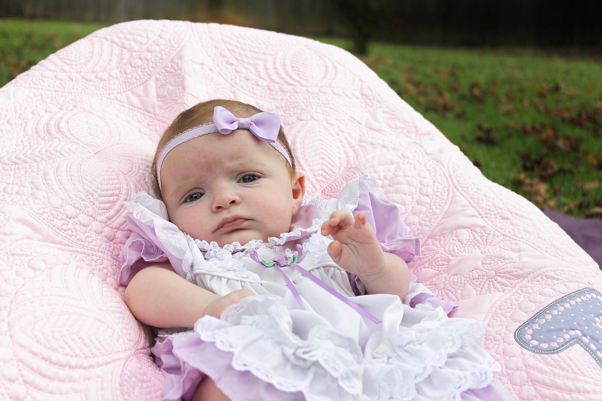 Ivey joined the competition — help win amazing prizes! baby, baby_products, baby_toddler_clothing, cheek, comfort, dress, eye, grass, hair_accessory, happy, head, headgear, headpiece, headwear, iris, person, pink, plant, purple, skin