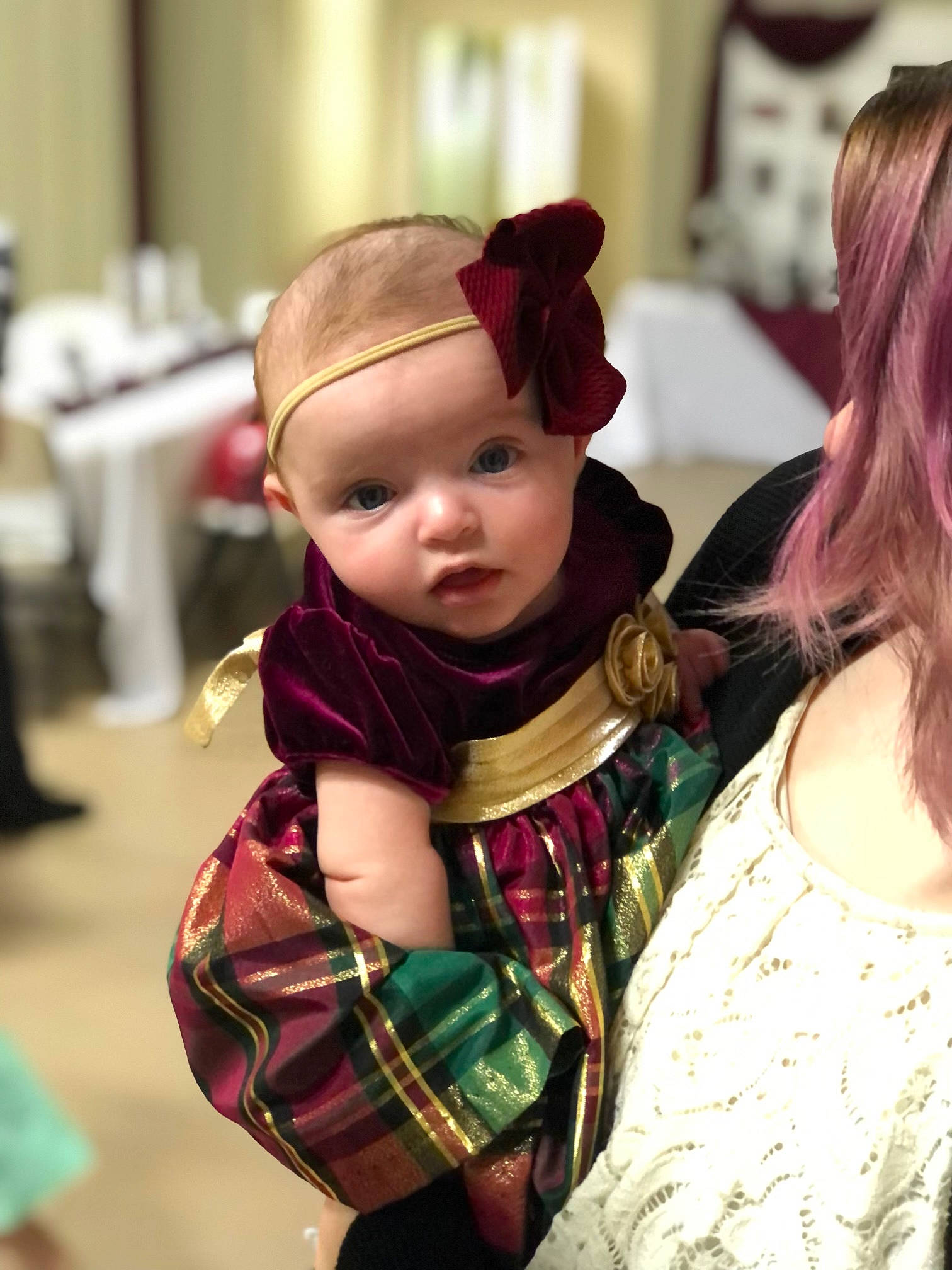 Ivey is registered to the contest to win money with this photo: baby, baby_toddler_clothing, child, costume, costume_hat, event, fashion_accessory, fashion_design, fun, fur, happy, headwear, holiday, jewellery, magenta, pattern, person, plaid, purple, tartan