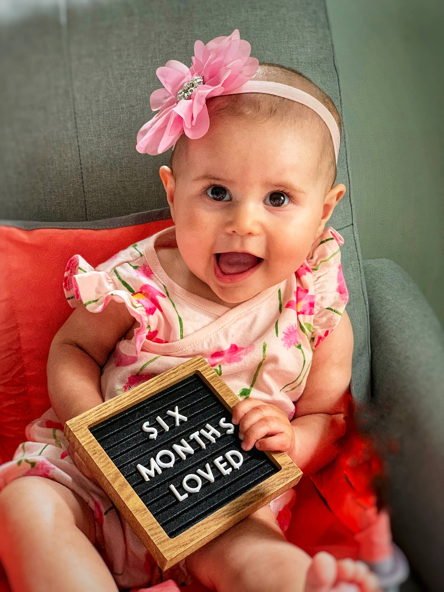 Aubrey joined the competition — help win amazing prizes! baby, baby_toddler_clothing, cheek, dress, eyelash, finger, font, hand, happy, headband, headpiece, jewellery, lip, magenta, nail, person, pink, skin, sleeve, smile