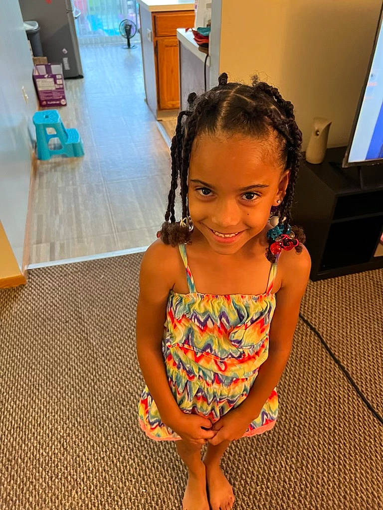 Destiny joined the competition — help win amazing prizes! barefoot, black_hair, chin, floor, flooring, fun, happy, hardwood, human_leg, iris, joint, joy, leisure, long_hair, person, shoulder, skin, smile, thigh, toddler