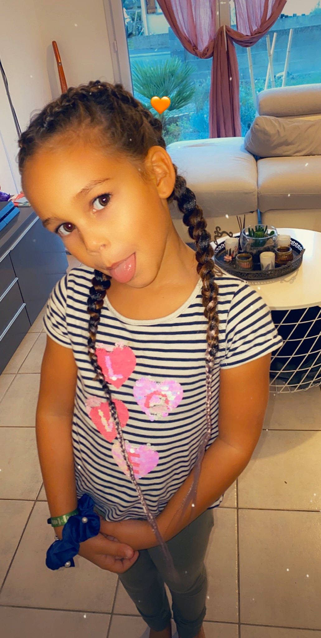 Thalïa a rejoint le concours — aidez-le/la à gagner de superbes lots ! black_hair, cheek, child, cornrows, forehead, hair, hairstyle, long_hair, neck, nose, person, pigtail, play, toddler
