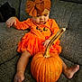 Leia joined the competition — help win amazing prizes! autumn, baby, bow, child, couch, cozy, curious, cute, face, fall, festive, foot, hand, headband, home, indoor, orange_dress, pumpkin, sitting, toddler