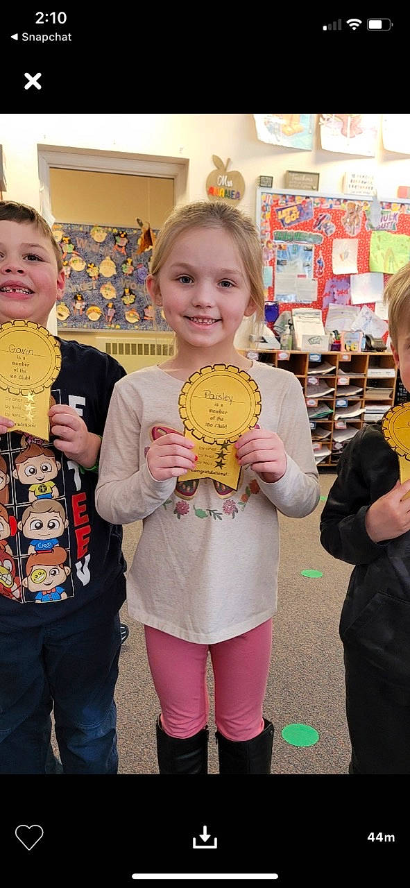 Paisley is registered to the contest to win money with this photo: academic_institution, chair, child, child_art, event, fun, happy, hoodie, joy, kindergarten, organ, person, picture_frame, room, school, sleeve, smile, t_shirt, toddler, visual_arts