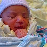 Mehmet is registered to the contest to win money with this photo: baby, blanket, blue, child, cozy, cute, face, hand, hat, hospital, infant, newborn, peaceful, pink, portrait, resting, sleeping, soft, striped, swaddled