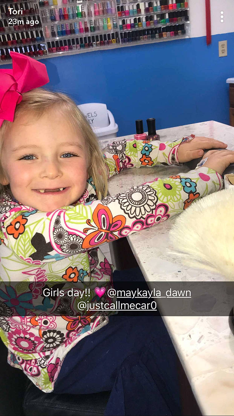 Farrah is registered to the contest to win money with this photo: child, day, girl, joy, material, pattern, person, product, sitting, textile, toddler