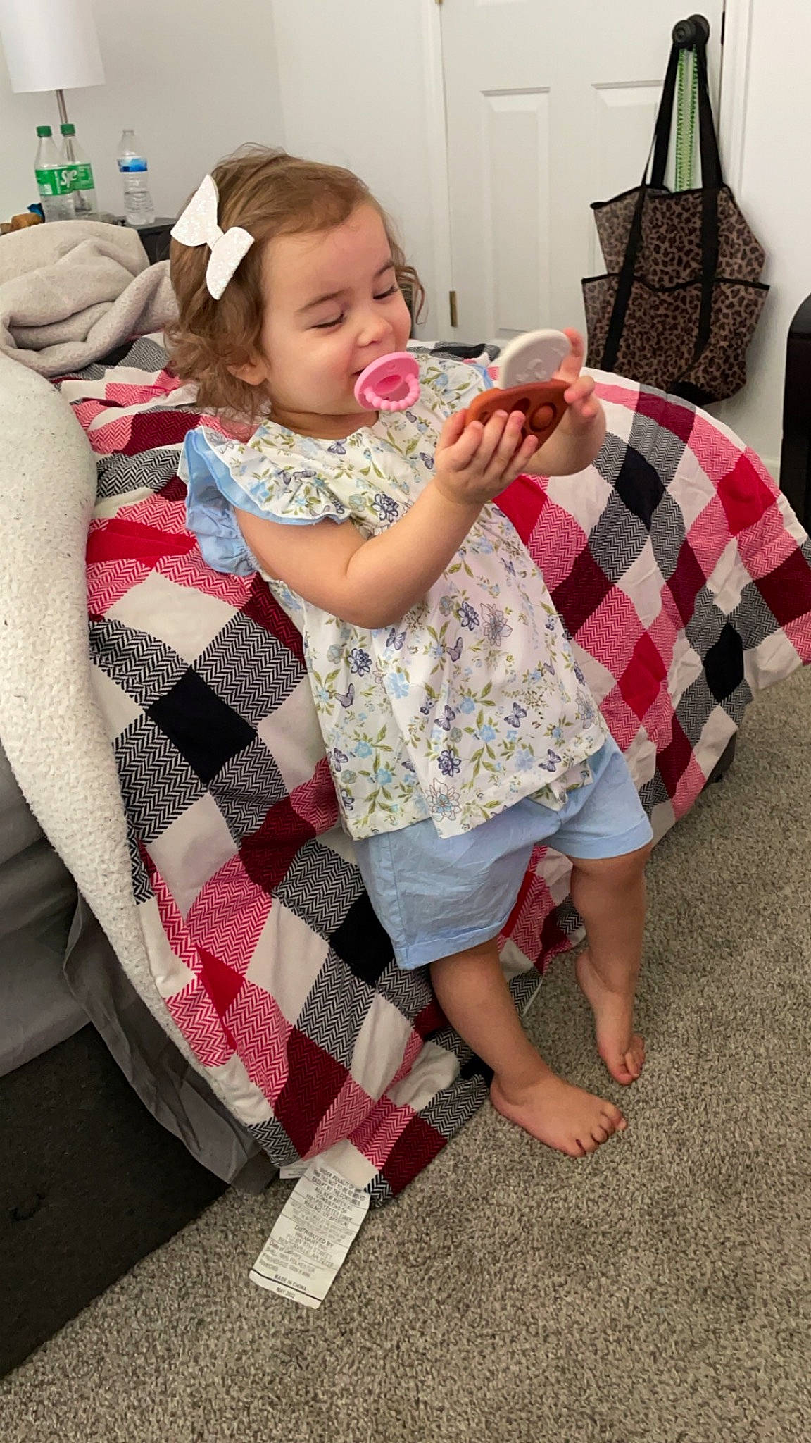 Julianna joined the competition — help win amazing prizes! bag, beauty, child, fashion, fun, hairstyle, happy, human, linens, luggage_and_bags, mammal, pattern, people, person, pink, plaid, shoulder, sleeve, tartan, textile