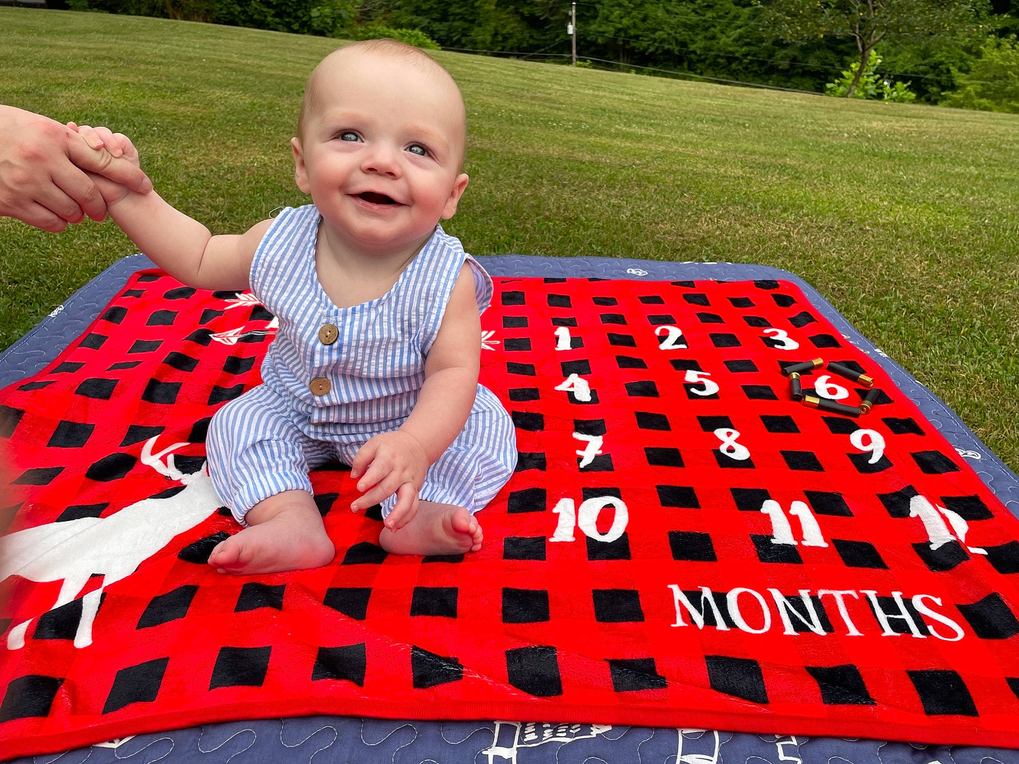 Ruger joined the competition — help win amazing prizes! baby, baby_toddler_clothing, child, flooring, fun, grass, green, happy, joy, lawn, leisure, pattern, people_in_nature, person, plant, play, recreation, rectangle, red, sleeve