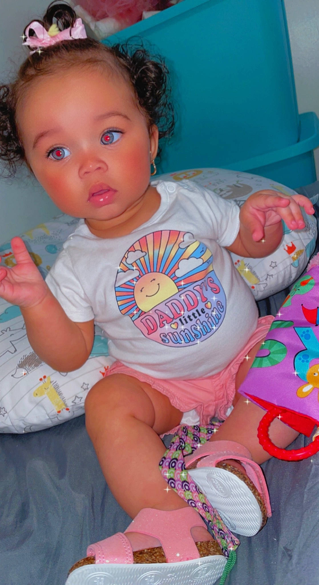 Jenesis is registered to the contest to win money with this photo: baby, baby_toddler_clothing, blue, cheek, child, finger, fun, happy, human_body, mouth, neck, nose, person, pink, skin, sleeve, stomach, surprise, thigh, toddler