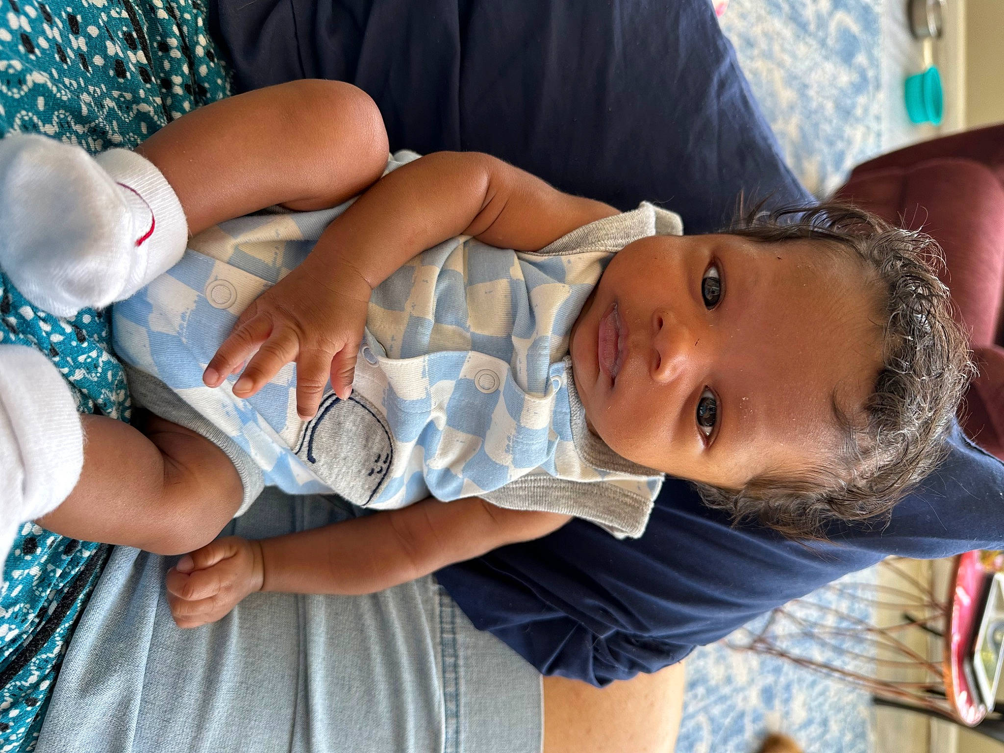 Ashtyn is registered to the contest to win money with this photo: abdomen, baby, baby_products, baby_toddler_clothing, blue, chest, child, comfort, elbow, finger, gesture, happy, human_leg, nail, pattern, person, skin, textile, thumb, toddler