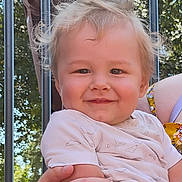 Aiden joined the competition — help win amazing prizes! toddler, child, smile, blonde_hair, outdoor, sunlight, trees, metal_bars, holding, person, happy, cute, baby_clothes, short_sleeves, face, portrait, nature, daylight, parent, hand