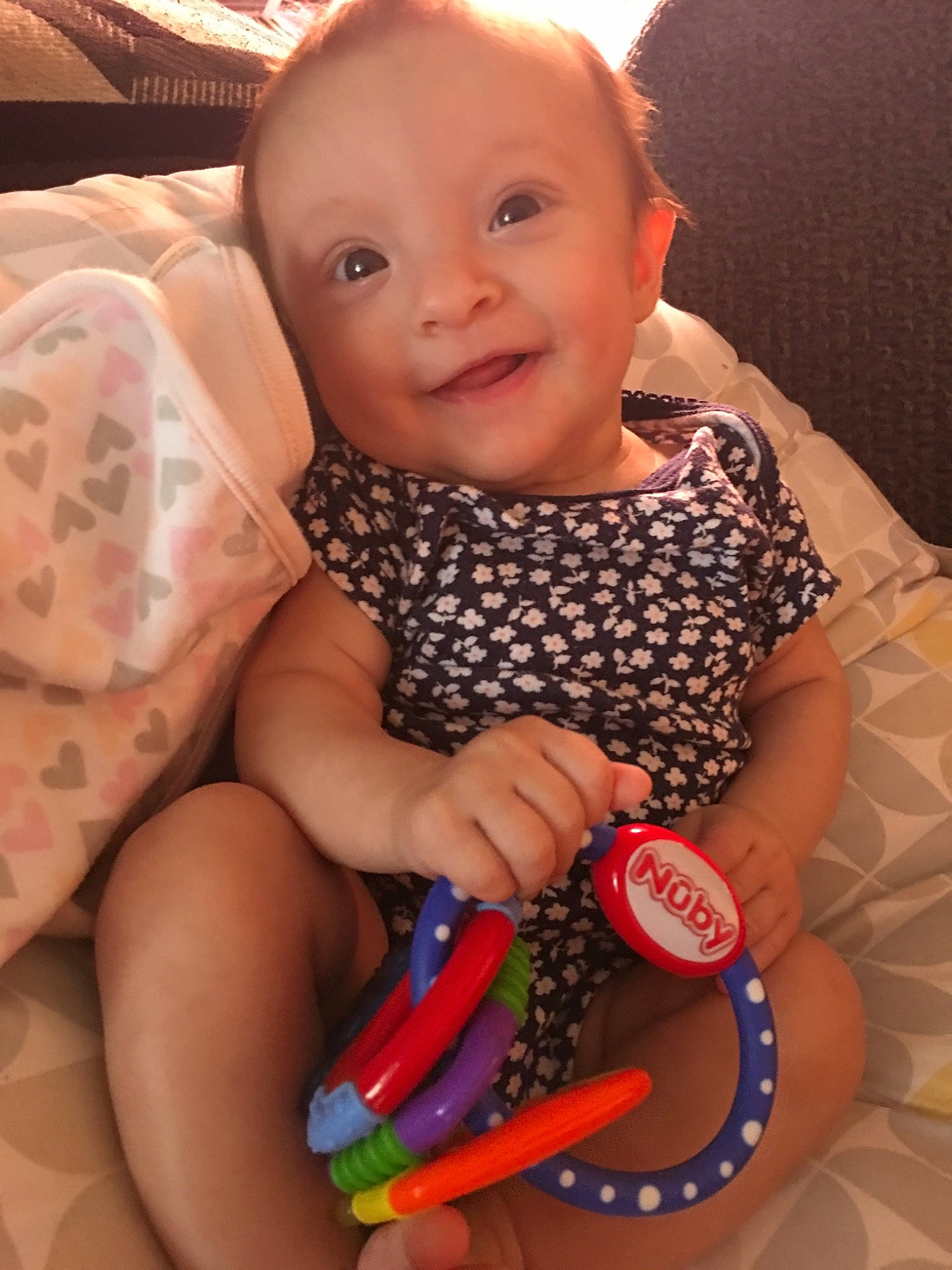 Kassandra joined the competition — help win amazing prizes! baby, child, eating, finger, fun, head, leg, mouth, neck, nose, person, play, product, sitting, skin, thigh, toddler