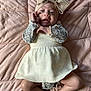 Ailani is registered to the contest to win money with this photo: baby, infant, child, headband, bow, dress, footwear, shoes, blanket, bedspread, fabric, patterned_clothing, soft_texture, cute, smiling, lying_down, indoors, person, newborn, pink