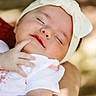 adorable, arm, baby, child, closeup, cute, expression, face, headband, headwear, infant, outdoor, peaceful, portrait, rest, skin, sleeping, soft_light, white_clothing, young