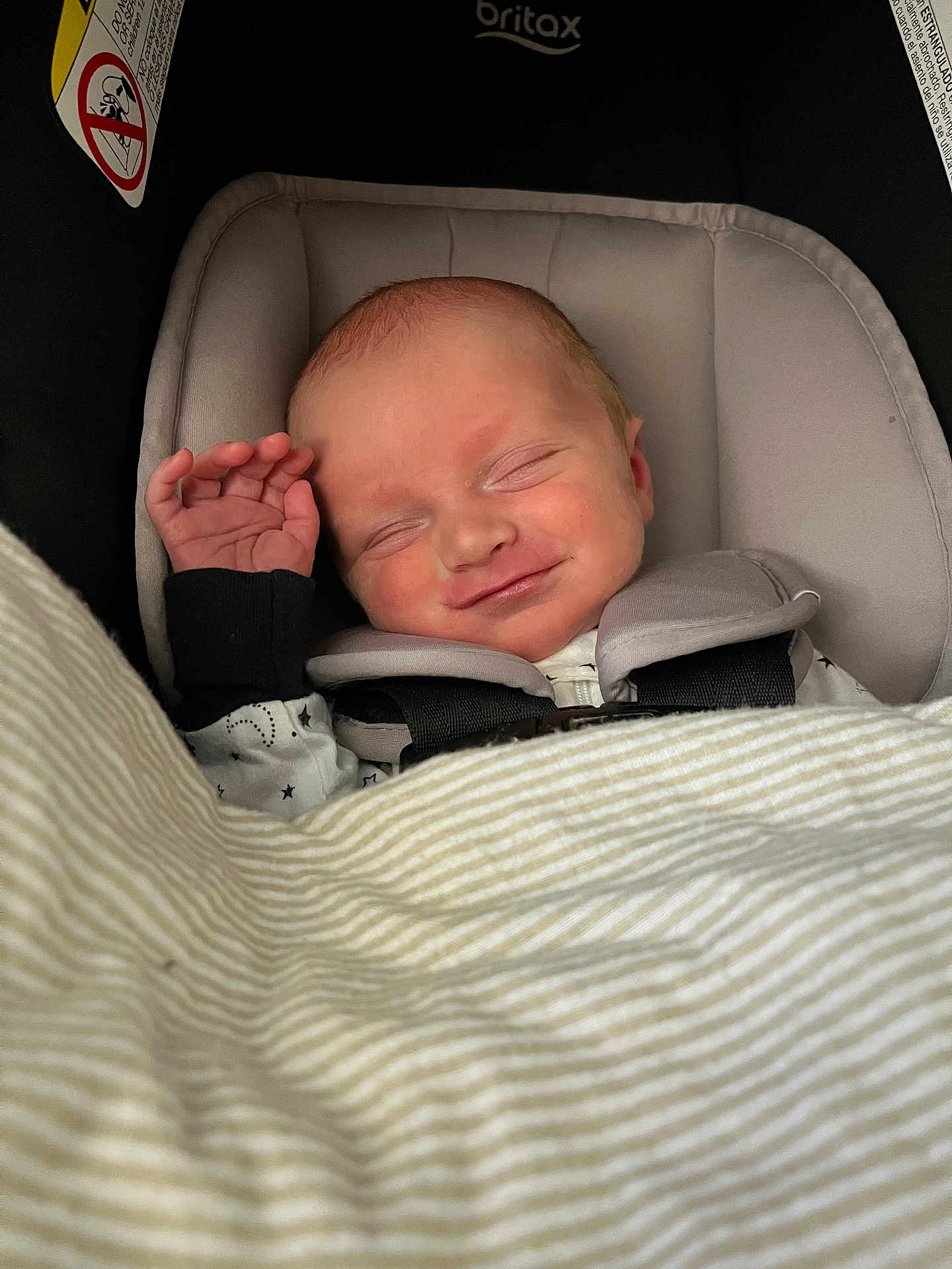 Layne joined the competition — help win amazing prizes! baby, newborn, car_seat, blanket, sleeping, smiling, infant, child, cozy, comfort, cute, face, hand, clothing, safety_belt, indoors, peaceful, resting, cute_expression, britax