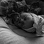 Lyla a rejoint le concours — aidez-le/la à gagner de superbes lots ! baby, infant, newborn, pacifier, sleeping, headwrap, denim_jacket, bead_chain, closed_eyes, hand, blanket, cozy, portrait, black_and_white, peaceful, swaddle, pacifier_clip, clothing, face, cute