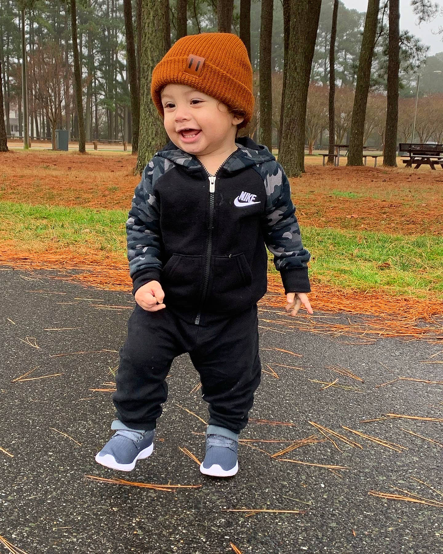 Bronson is registered to the contest to win money with this photo: baby_toddler_clothing, cap, child, electric_blue, eye, face, fun, grass, happy, head, headgear, headwear, jacket, joy, people_in_nature, person, plant, recreation, sleeve, smile