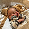 baby, sleeping, pacifier, crib, blanket, teddy_bear, cozy, infant, child, soft, comfort, striped_clothing, resting, cute, cute_baby, indoors, portrait, peaceful, napping, head