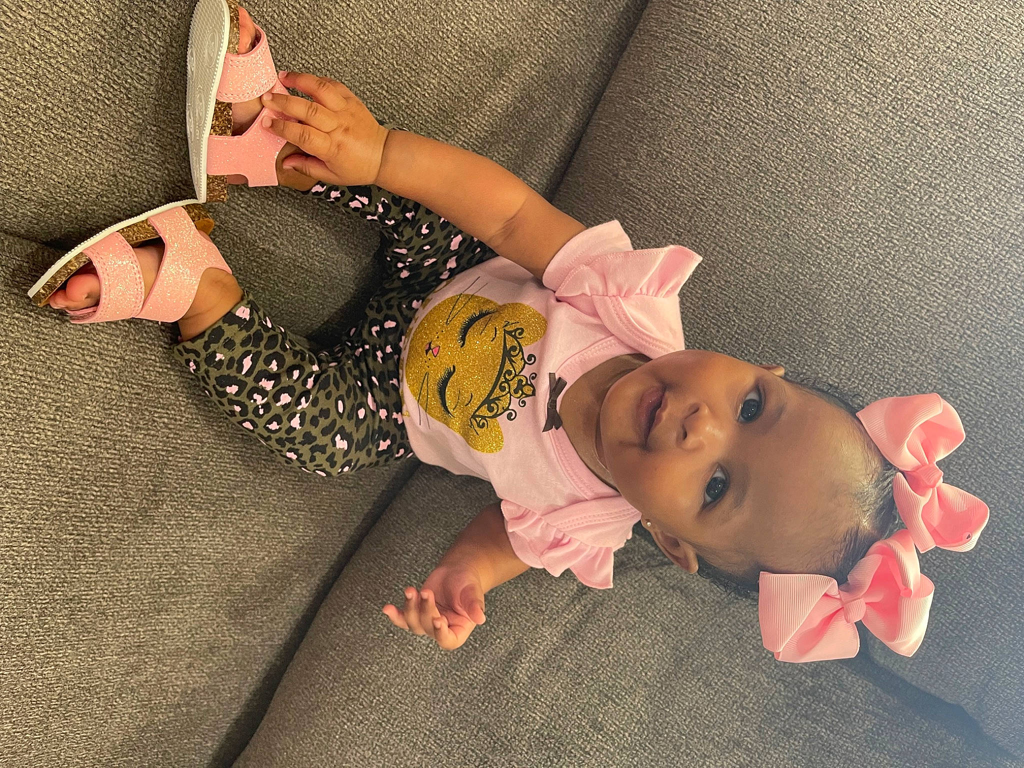 Imani joined the competition — help win amazing prizes! baby, baby_products, baby_toddler_clothing, cheek, child, comfort, doll, finger, foot, leg, linens, pattern, person, pink, room, sitting, sleeve, thigh, toddler, wood