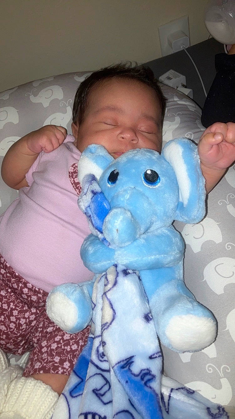 Jurnee joined the competition — help win amazing prizes! baby, baby_products, baby_sleeping, baby_toddler_clothing, baby_toys, bedtime, blue, cheek, child, comfort, electric_blue, fur, linens, person, pink, plush, skin, stuffed_toy, textile, toddler