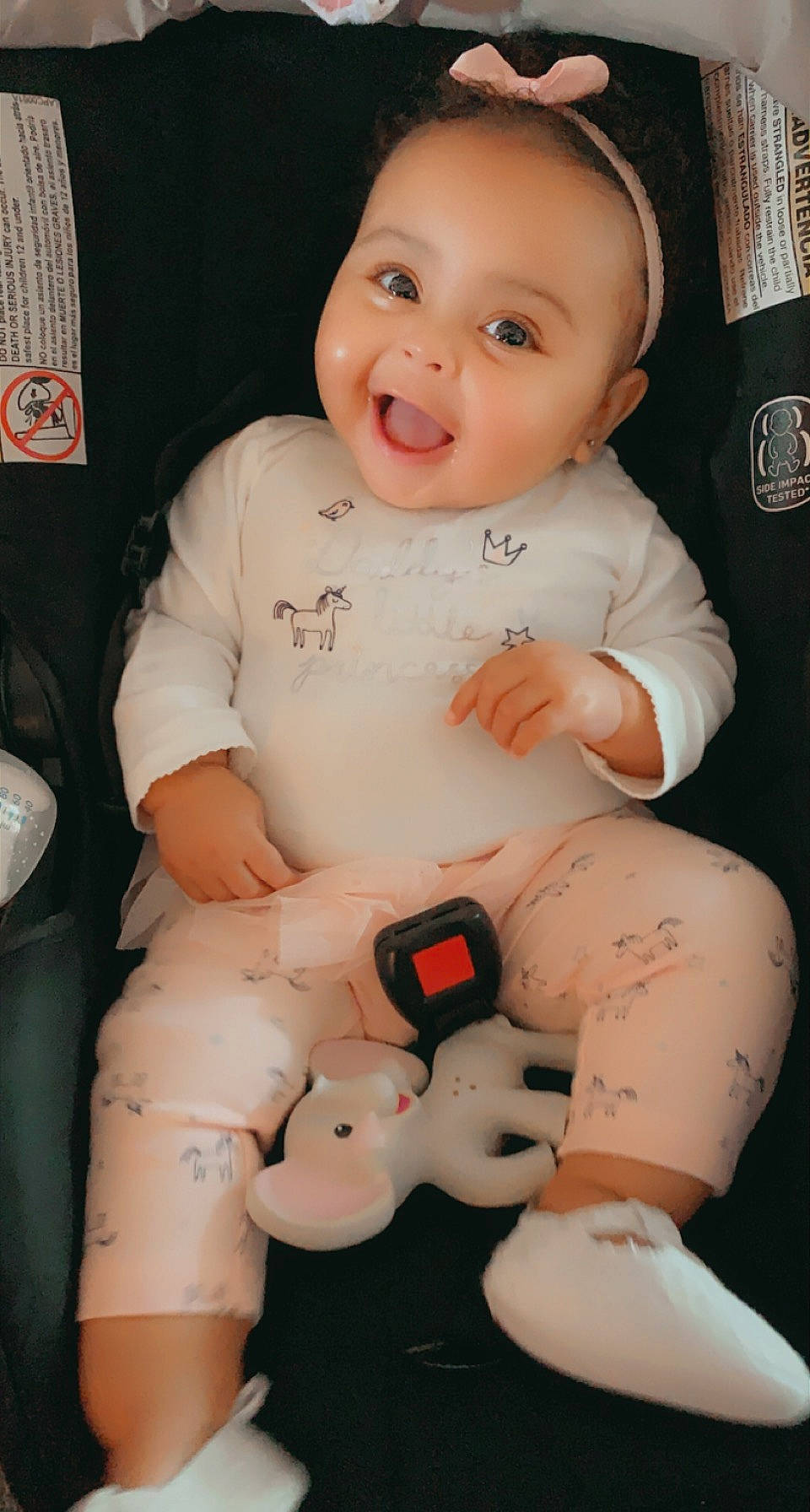 Janaya is registered to the contest to win money with this photo: baby, baby_toddler_clothing, cheek, chest, comfort, finger, gesture, happy, human_body, joint, knee, mouth, organ, person, pink, skin, smile, stomach, thigh, thumb