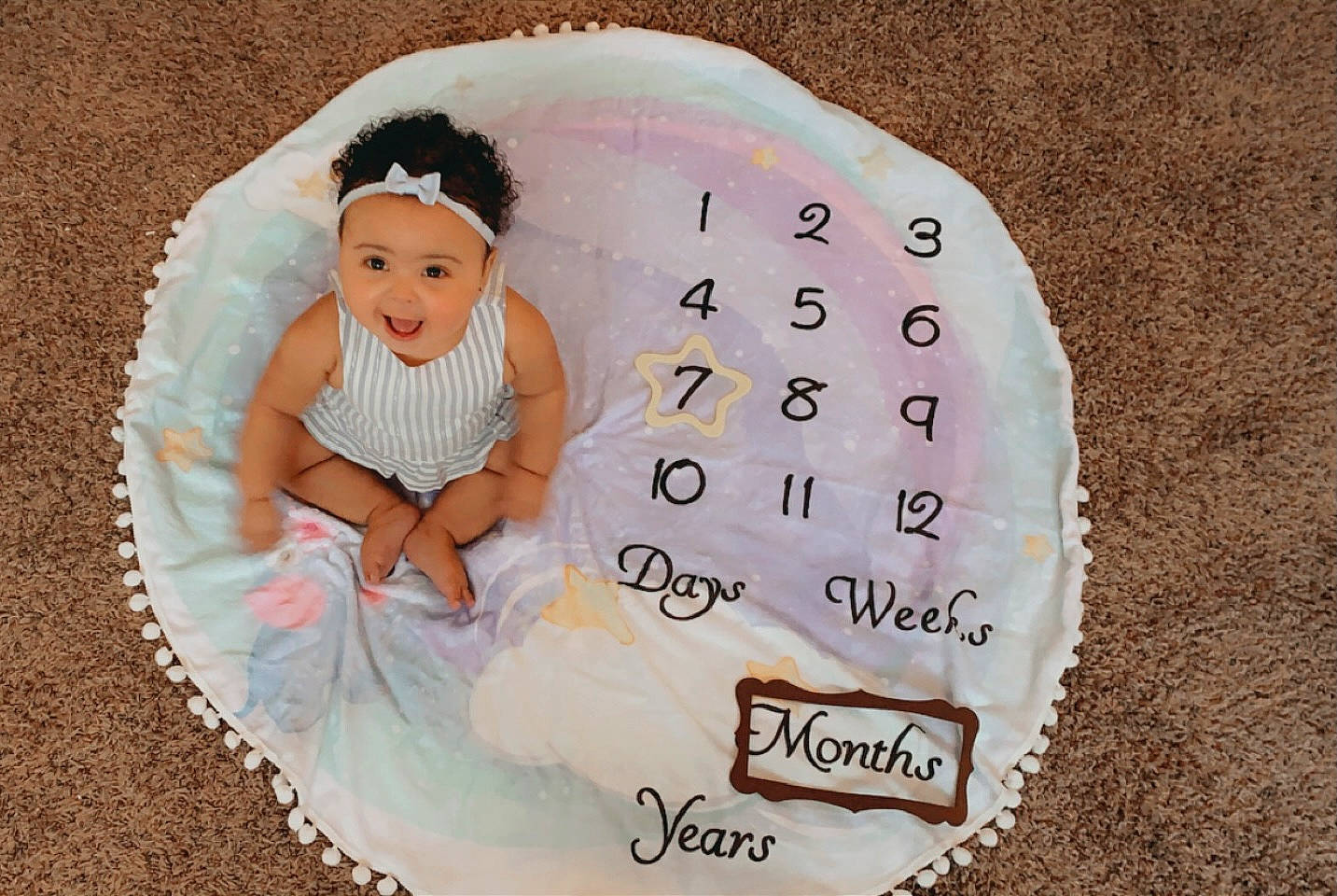 Janaya joined the competition — help win amazing prizes! baby, baby_products, baby_toddler_clothing, child, circle, comfort, fashion_accessory, font, grass, happy, headpiece, headwear, joy, linens, magenta, pattern, person, pink, portrait_photography, product