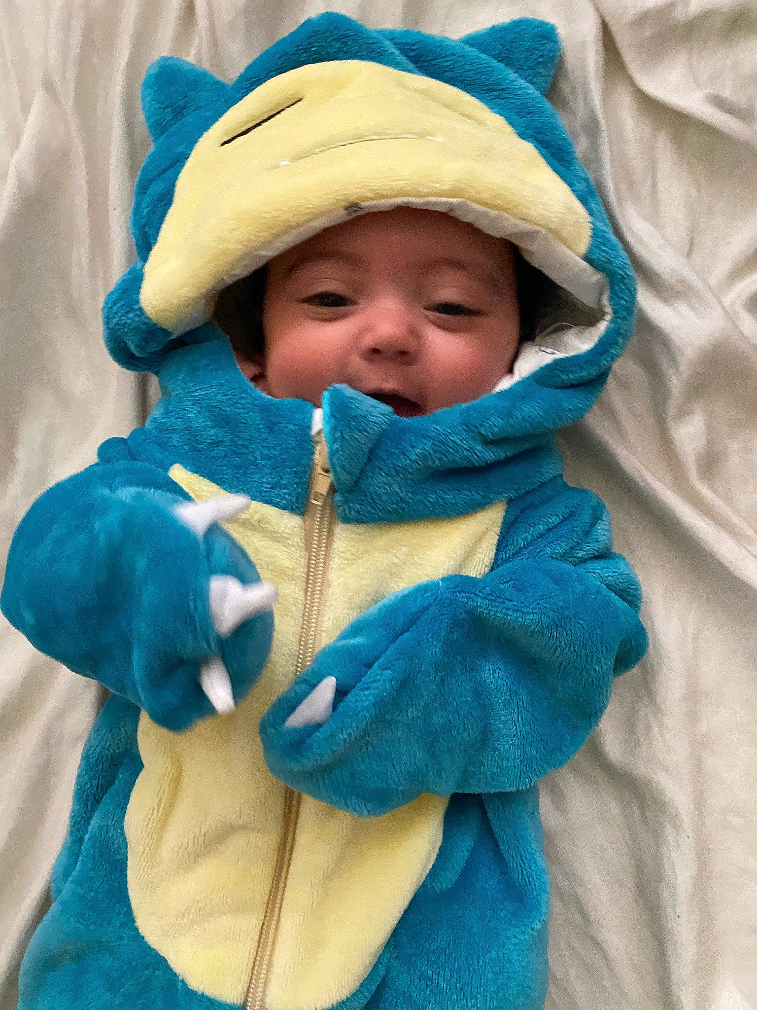Naia joined the competition — help win amazing prizes! baby, baby_products, baby_toddler_clothing, cap, cheek, child, comfort, electric_blue, eye, face, facial_expression, grass, hat, headgear, headwear, linens, outerwear, person, skin, sun_hat