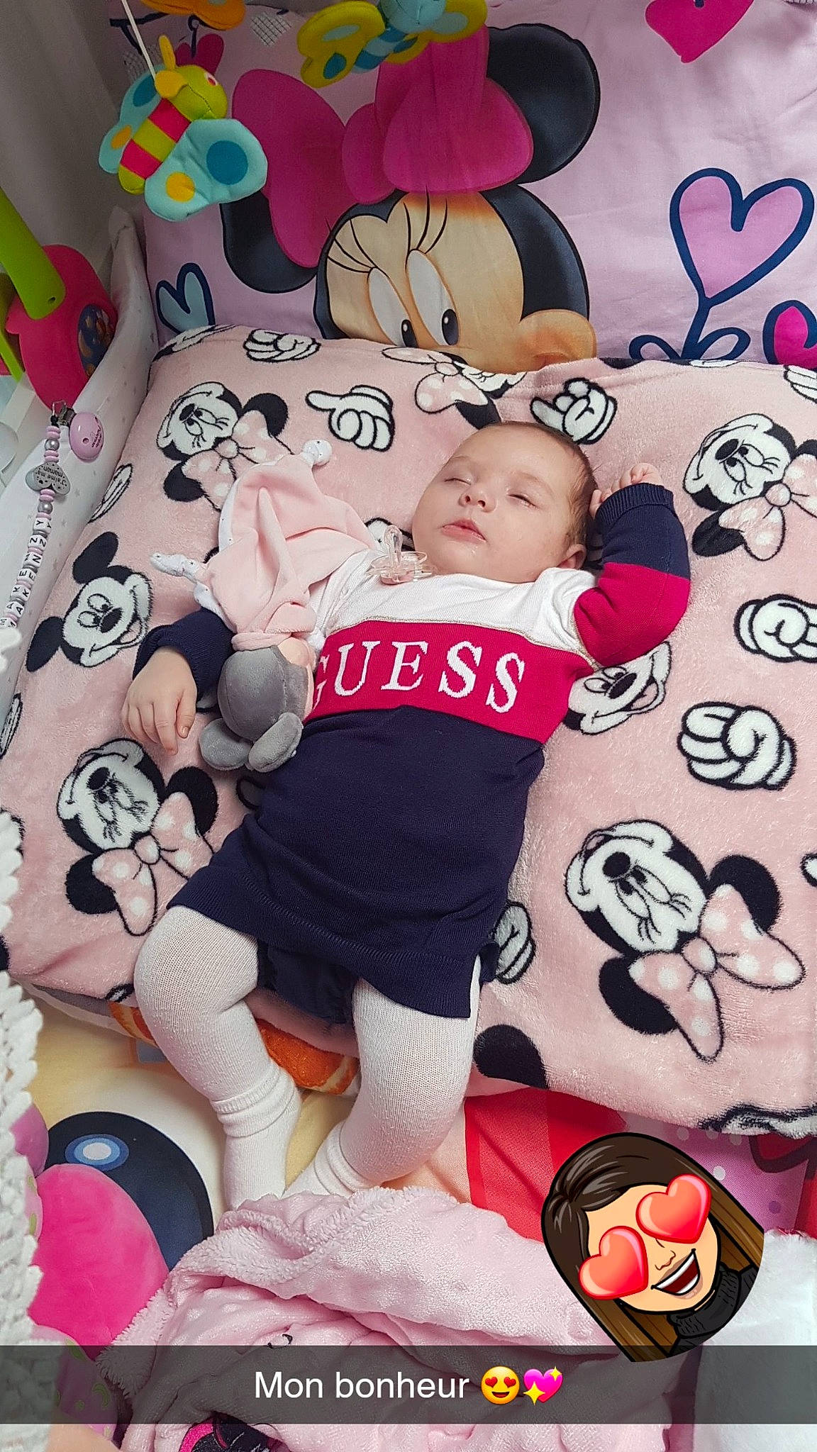Makenzy participe au concours pour gagner de l'argent avec cette photo : baby, baby_toddler_clothing, cheek, comfort, font, fun, happy, head, linens, magenta, mammal, pattern, person, pillow, pink, shorts, sleeve, t_shirt, textile, toddler