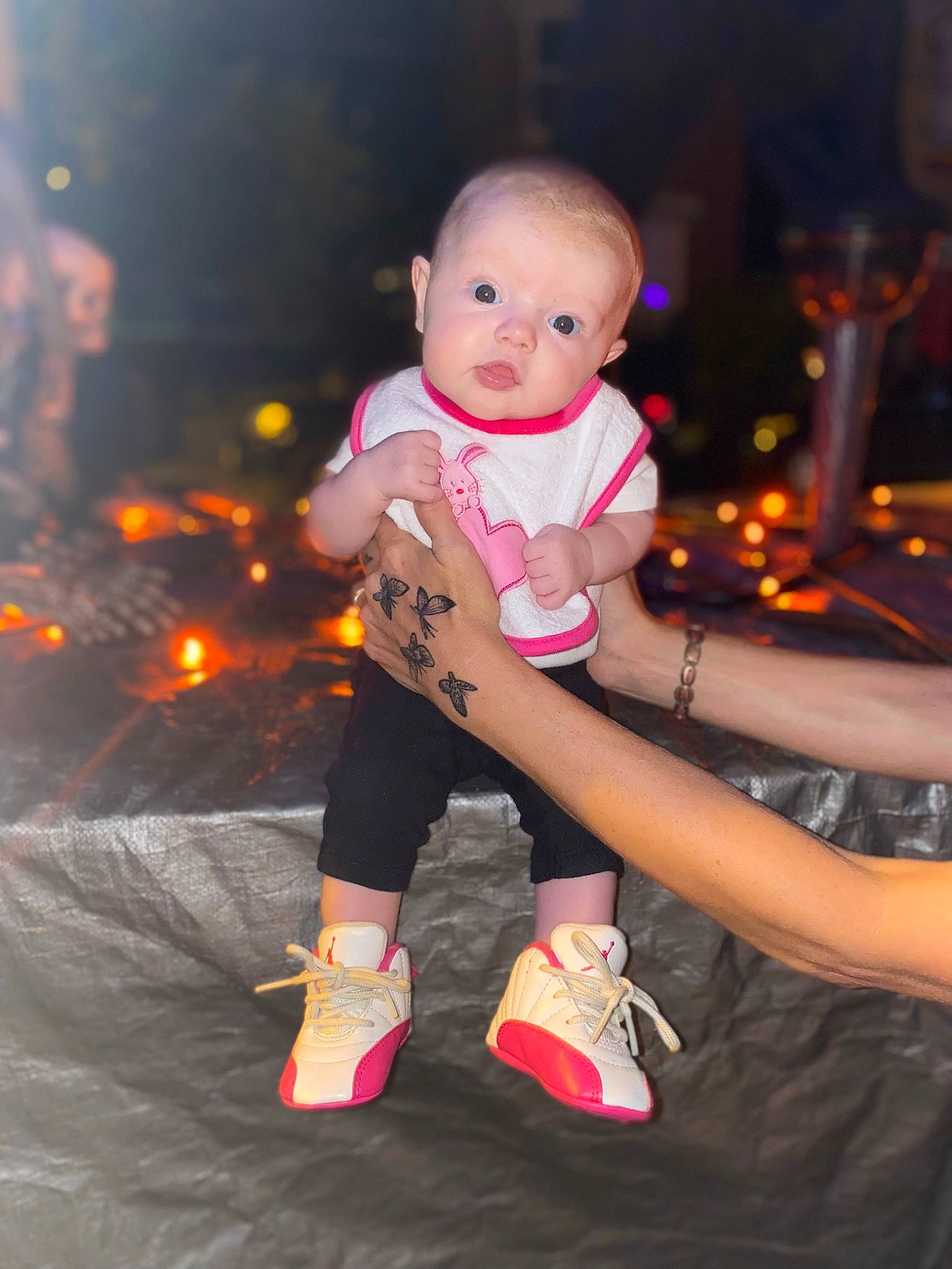 Lyric joined the competition — help win amazing prizes! baby, baby_toddler_clothing, child, event, flash_photography, fun, happy, holiday, human, human_leg, lap, leisure, orange, party, person, pink, shorts, sitting, sock, standing