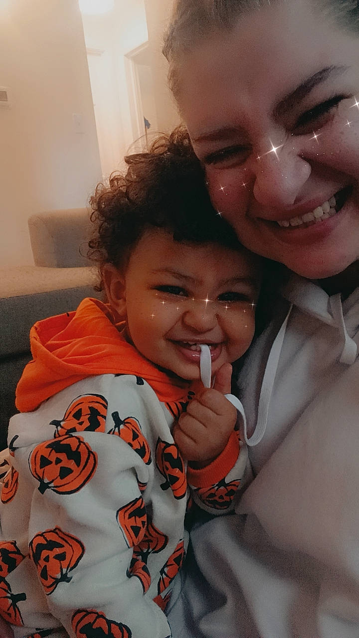 Giovanni is registered to the contest to win money with this photo: black_hair, cheek, event, eyewear, finger, forehead, fun, gesture, happy, interaction, joy, lip, mouth, nose, person, skin, smile, sunglasses, thumb, toddler