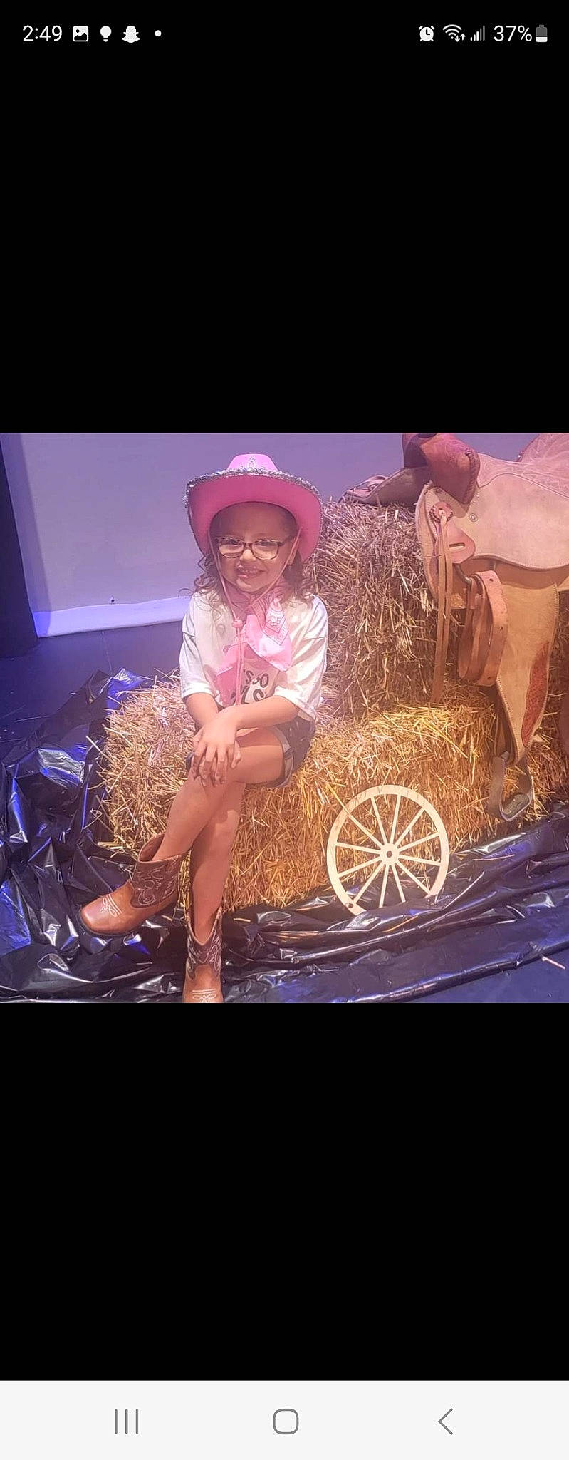 Aubry joined the competition — help win amazing prizes! cap, cool, electric_blue, entertainment, event, fashion_accessory, flash_photography, fun, happy, hat, headwear, human_leg, joy, leisure, magenta, music_venue, performing_arts, person, pink, sun_hat