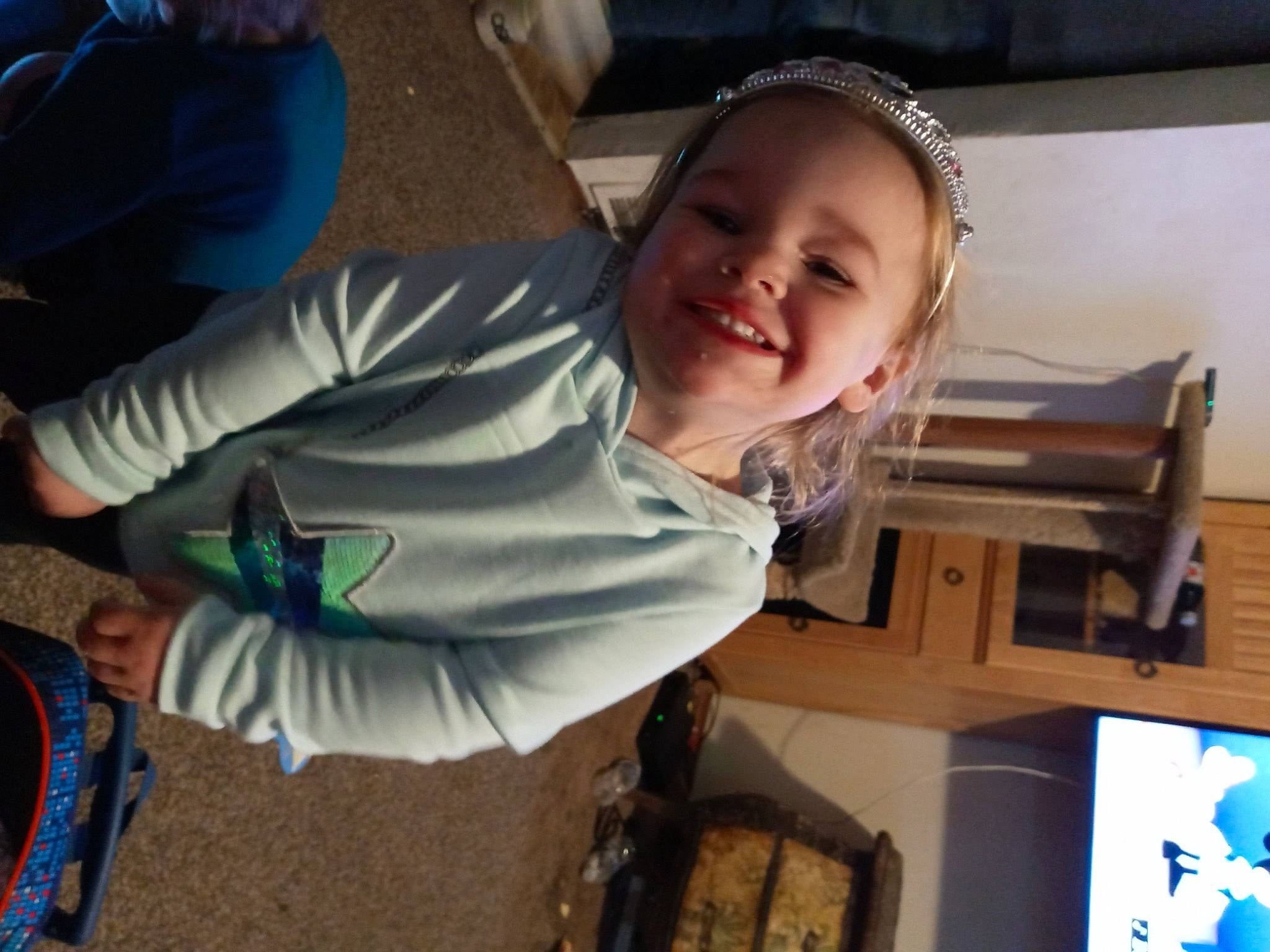 Phoenix is registered to the contest to win money with this photo: blue, child, fun, happy, joy, laugh, leisure, person, play, recreation, sitting, smile, snapshot, soil, summer, t_shirt, toddler, tree, vacation, wood