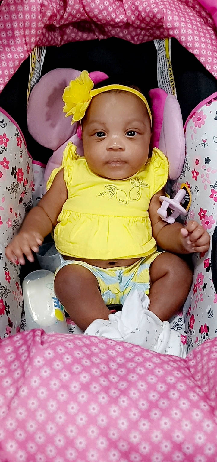 Winner joined the competition — help win amazing prizes! baby, baby_toddler_clothing, chair, cheek, child, comfort, event, finger, fun, happy, human_leg, iris, pattern, person, pink, purple, sitting, skin, thigh, toddler