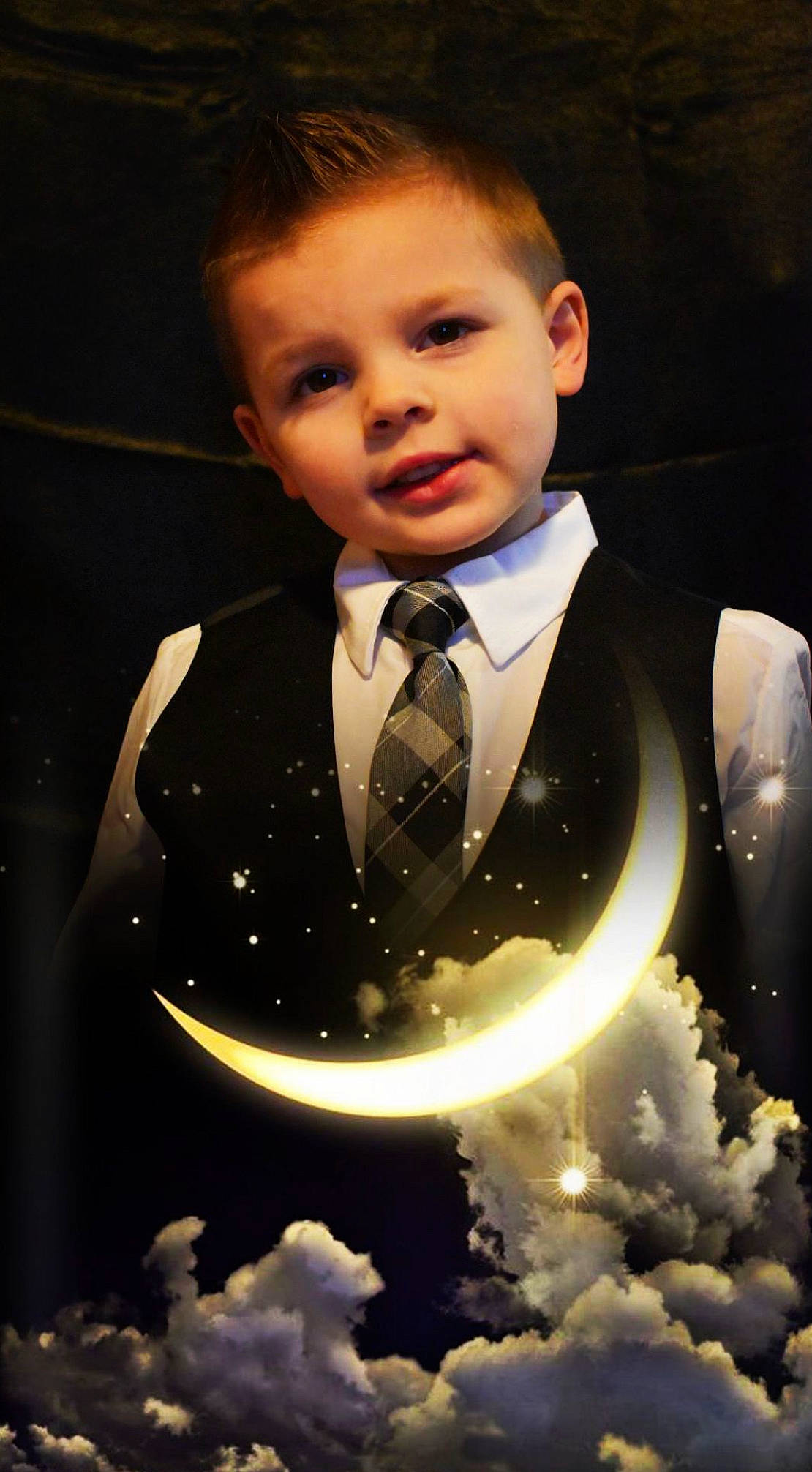 Karson is registered to the contest to win money with this photo: blazer, bow_tie, button, collar, dress_shirt, electric_blue, entertainment, event, flash_photography, formal_wear, gesture, music, people_in_nature, performing_arts, person, sleeve, suit, tie, toddler, tuxedo