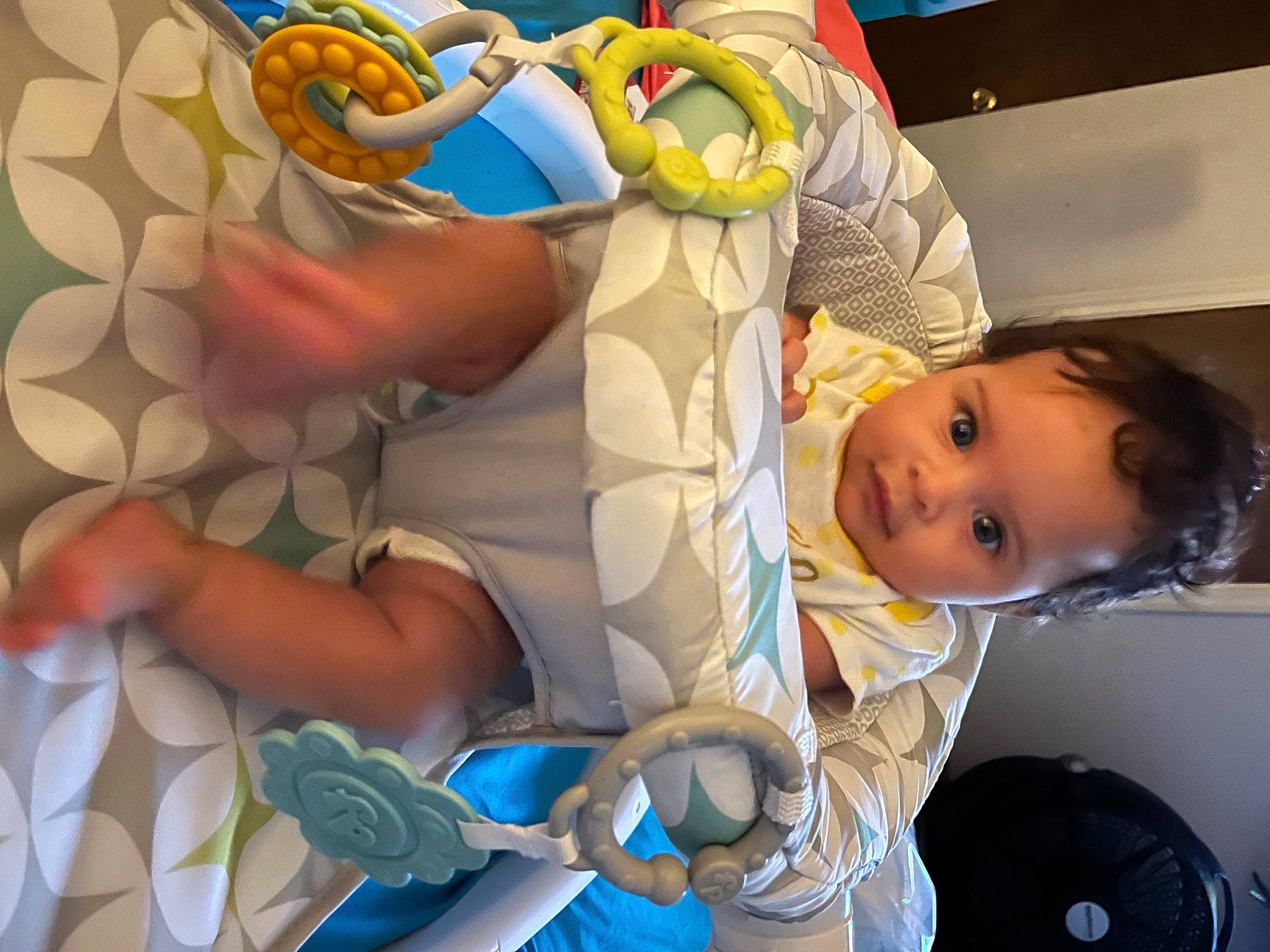 Myka is registered to the contest to win money with this photo: automotive_design, baby, baby_products, child, fun, happy, hat, person, plastic, product, room, smile, stuffed_toy, tire, toddler, toy, vacation, vehicle_door, visual_arts, wheel