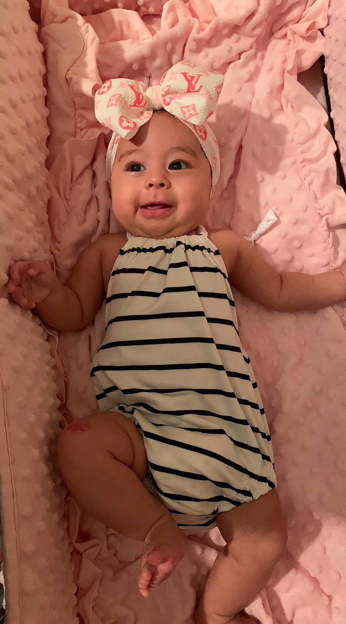 Abilene is registered to the contest to win money with this photo: baby, baby_products, baby_toddler_clothing, cheek, child, headgear, headwear, person, pink, product, skin, toddler