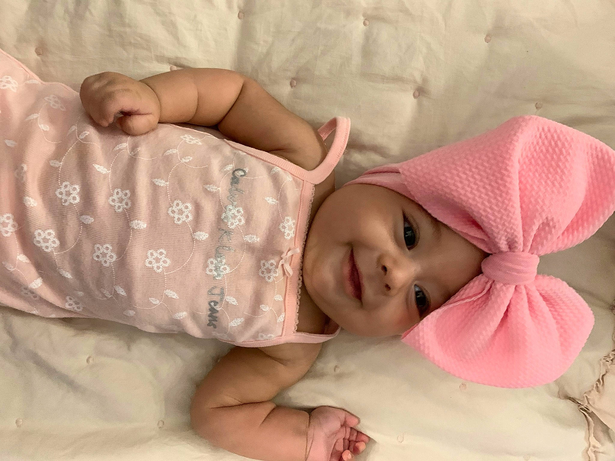 Abilene joined the competition — help win amazing prizes! baby, baby_sleeping, baby_toddler_clothing, cheek, child, hair_accessory, hand, head, headgear, headwear, joy, linens, person, pink, product, skin, textile, toddler