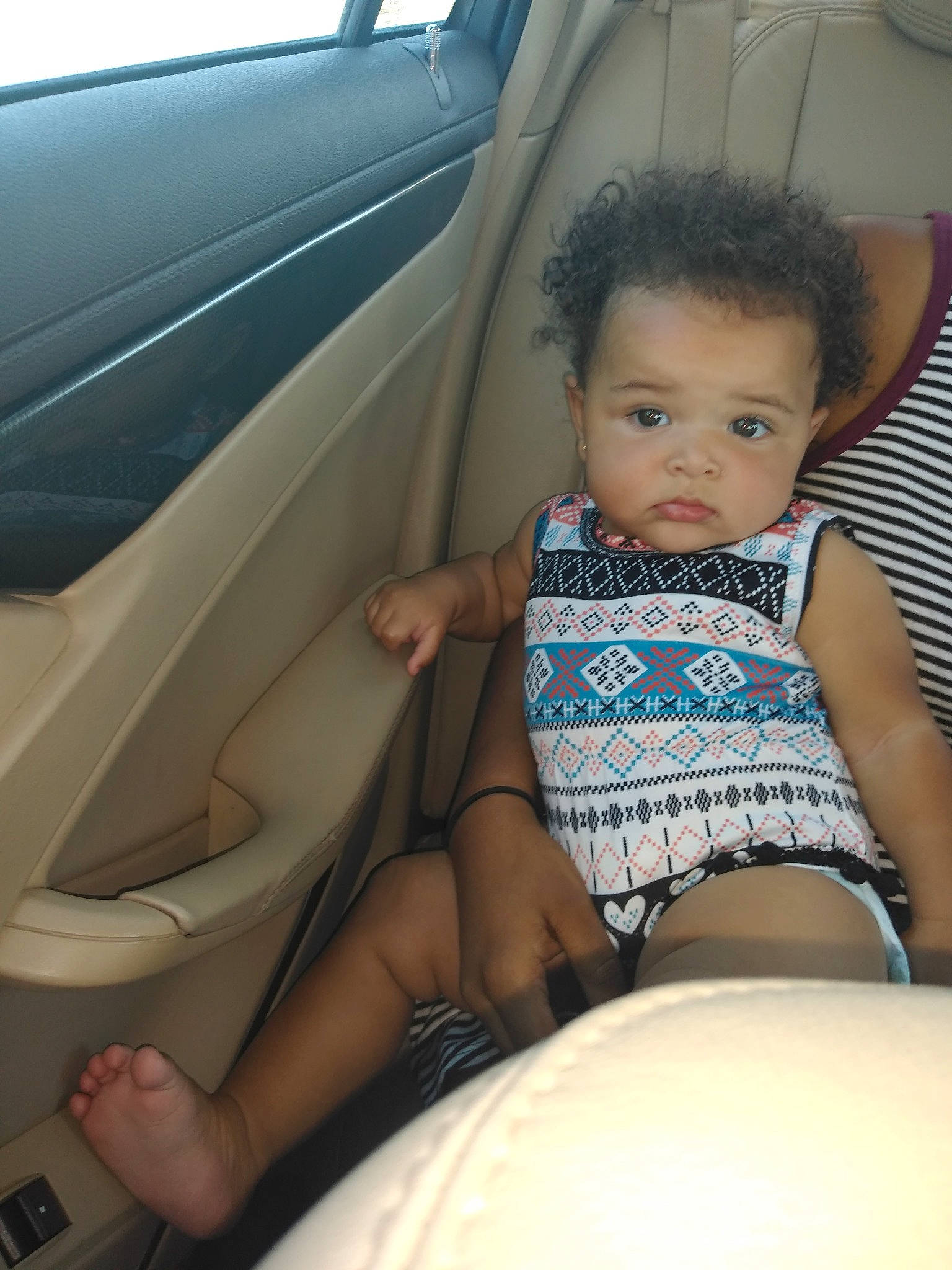Kahlia joined the competition — help win amazing prizes! auto_part, baby, car, car_seat, car_seat_cover, child, family_car, finger, hand, leg, person, seat_belt, sitting, skin, toddler, vehicle, vehicle_door
