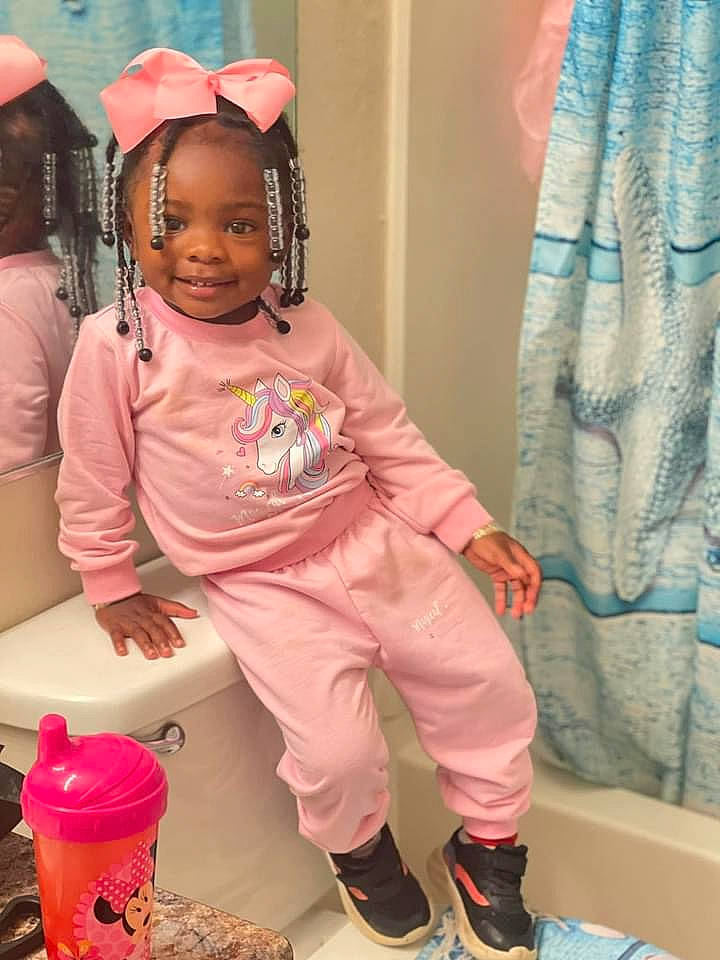 Aviana joined the competition — help win amazing prizes! baby_toddler_clothing, child, costume, curtain, event, fun, happy, joy, magenta, pattern, peach, person, pink, play, purple, red, sitting, sleeve, smile, t_shirt