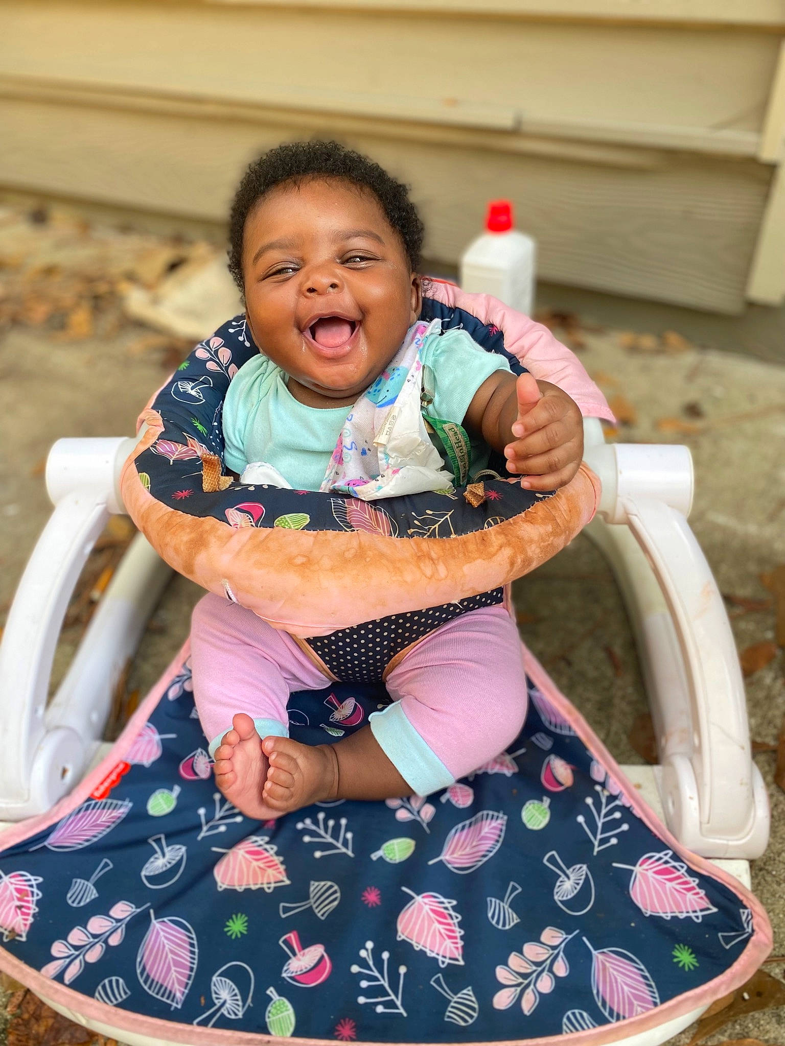 Alayah joined the competition — help win amazing prizes! baby_toddler_clothing, child, event, face, facial_expression, fun, grass, hair, hairstyle, hand, happy, leisure, people, person, pink, product, recreation, sitting, skin, toddler