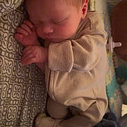 Oakleigh Jaylen joined the competition — help win amazing prizes! newborn, baby, sleeping, pajamas, blanket, bed, patterned_bedding, cozy, infant, peaceful, child, cute, indoors, rest, soft_lighting, hand, face, head, person, sleep