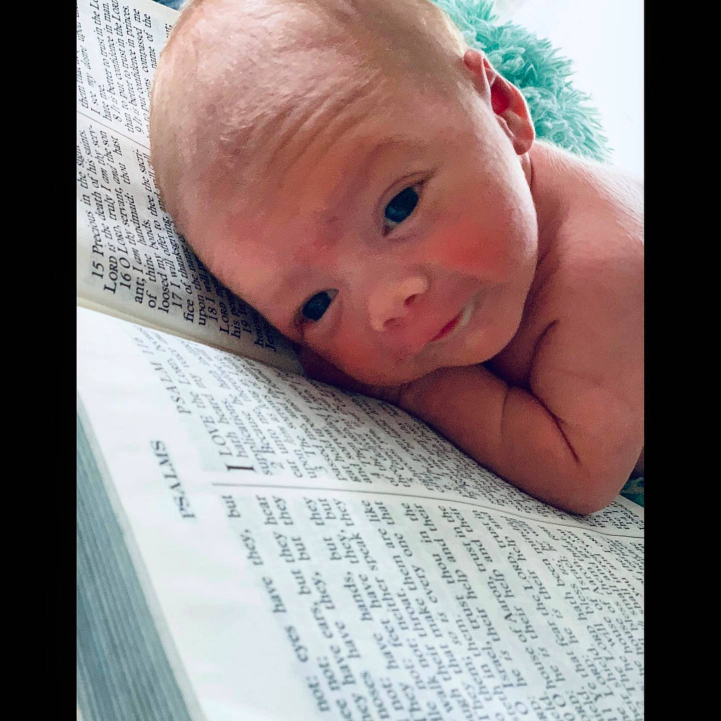 Whitley joined the competition — help win amazing prizes! baby, cheek, child, chin, close_up, ear, eye, eyebrow, face, facial_expression, finger, forehead, hand, head, lip, mouth, nose, person, photo_caption, skin