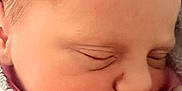 Robyn joined the competition — help win amazing prizes! newborn, baby, sleeping, face, blanket, hat, closeup, skin, infant, cozy, soft, peaceful, child, head, pink, wrapped, cute, young, resting, warm